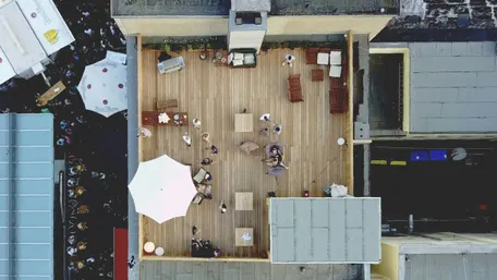 a helicopter view of a big, wooden rooftop in the Bochum Bermuda triangle.