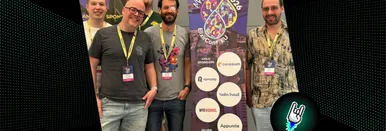 Das 9elements Team vor einem Schild der ElixirConfEU 2026.