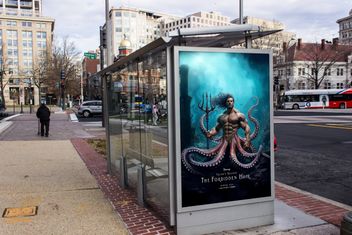 Mockup of the fake movie poster "The Forbidden Heir" at bus stop