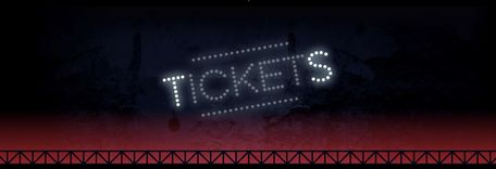 Flashing neon sign with the inscription "Tickets" against a dark background